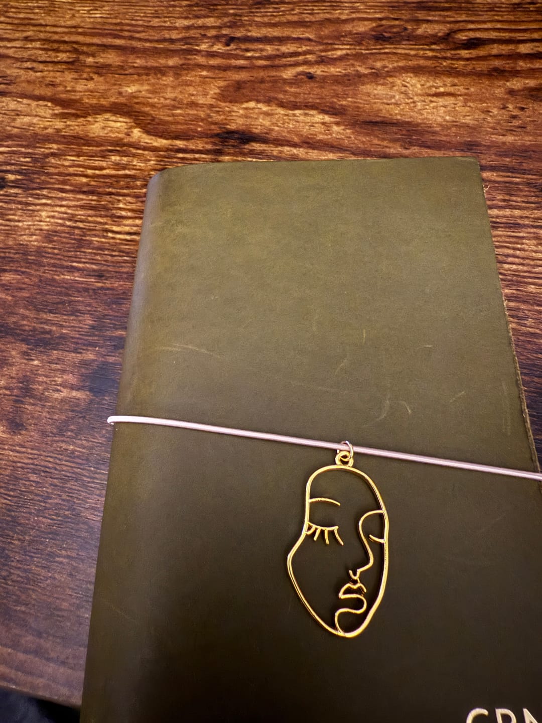 Customer photo review of Abstract Art Face Charm - Creative Muse