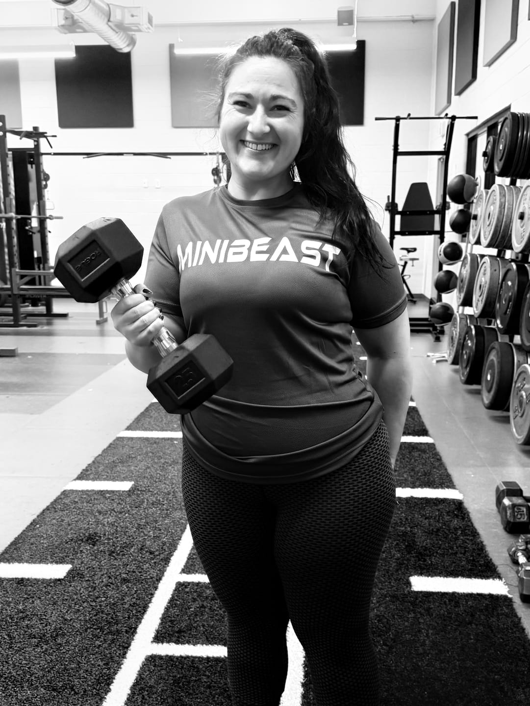 Customer photo review of "Girls Who Lift" Performance Unisex Tee