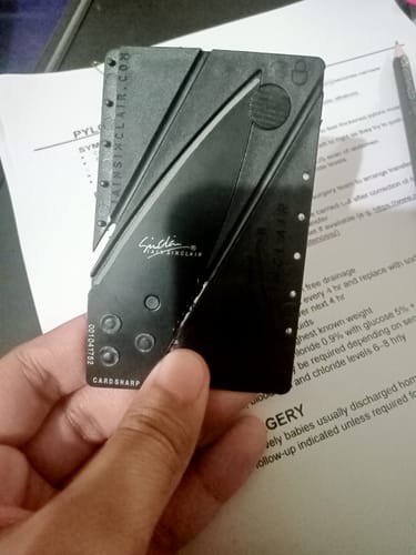 Customer photo review of Folding Card Tool - Best for Wallet