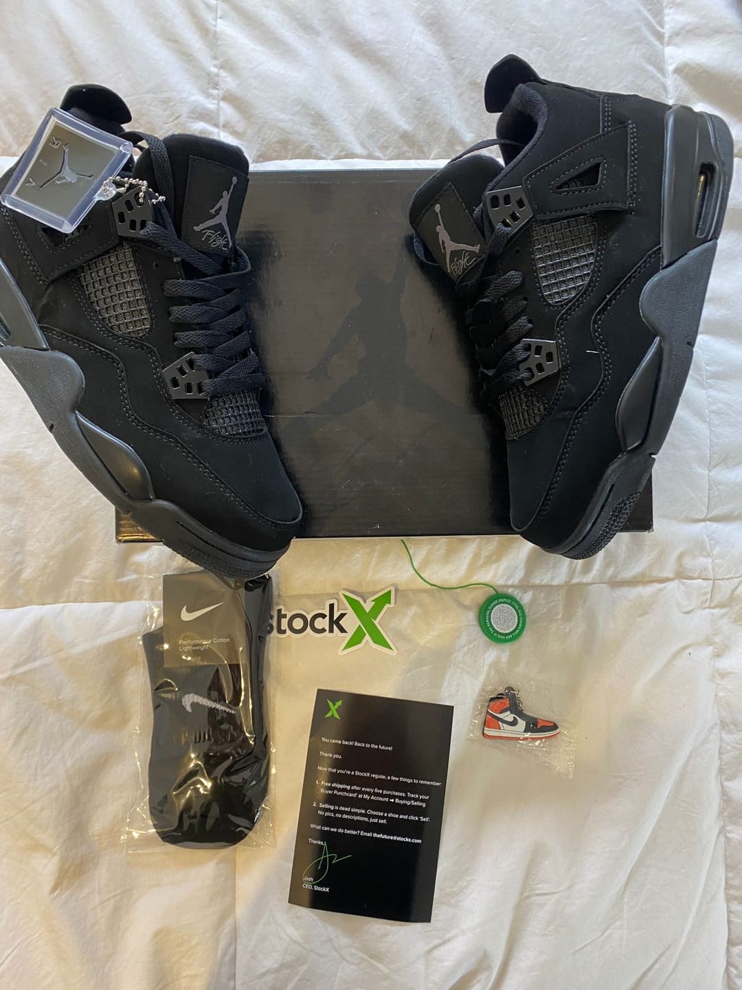 Customer photo review of Air Jordan 4 Retro 'Black Cat'
