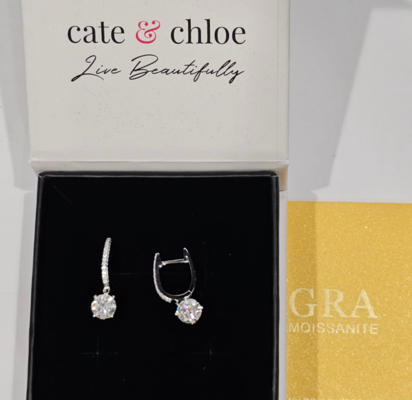 Customer photo review of Moissanite by Cate & Chloe Finley 18k Gold Plated 925 Sterling Silver Dangle Earrings 2.13tcw
