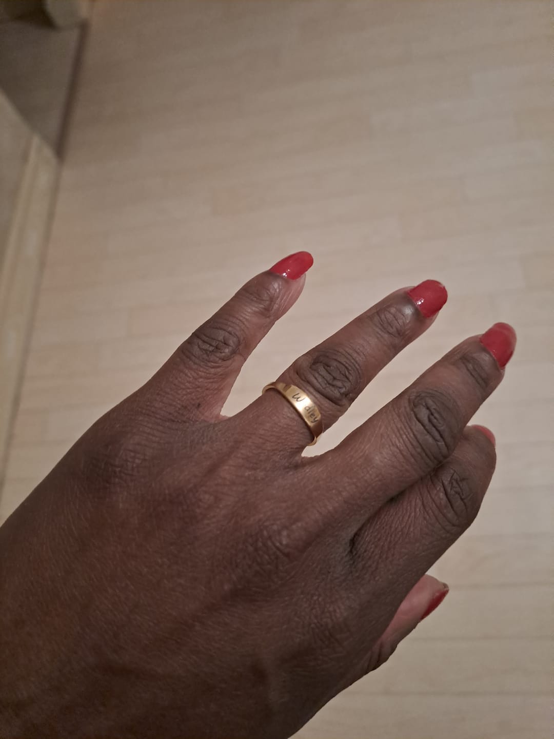 Customer photo review of Engraved Thin Name Ring