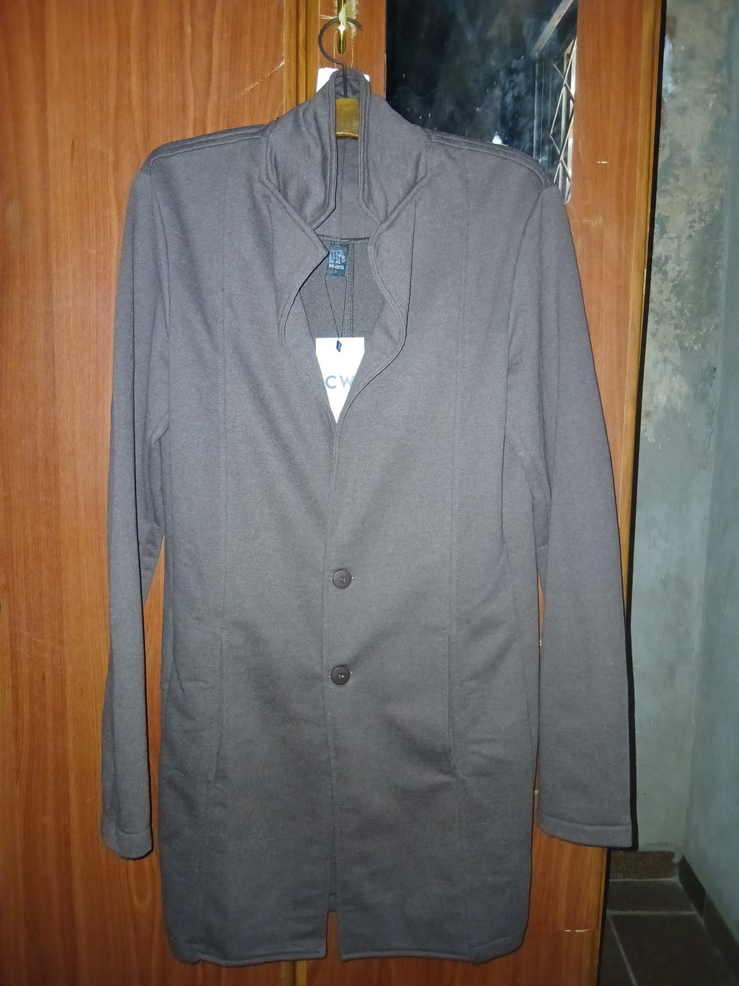 Customer photo review of Sobretudo Slim Moletinho Marrom