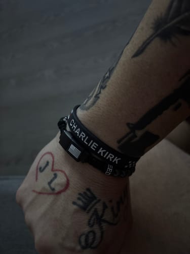 Customer photo review of 00 Buck Magnum Titanium Magnetic Bracelet : Helps Pair Veterans With A Service Dog Or Shelter Dog