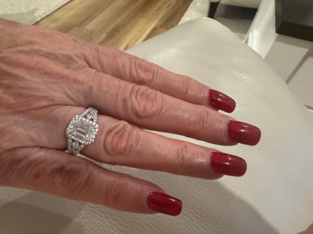 Customer photo review of Vintage Inspired Halo Emerald-Cut Moissanite Pave Engagement Ring