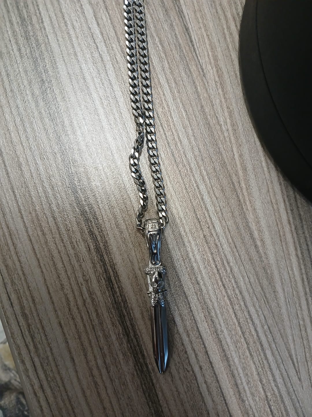 Customer photo review of CATACOMB SWORD PENDANT