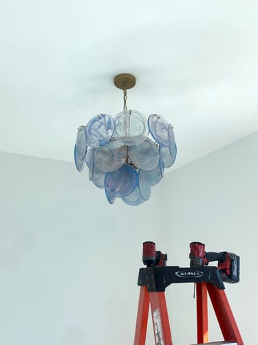 Customer photo review of Glam Blue Iridescent Swirl Glass Round Tiered Chandelier