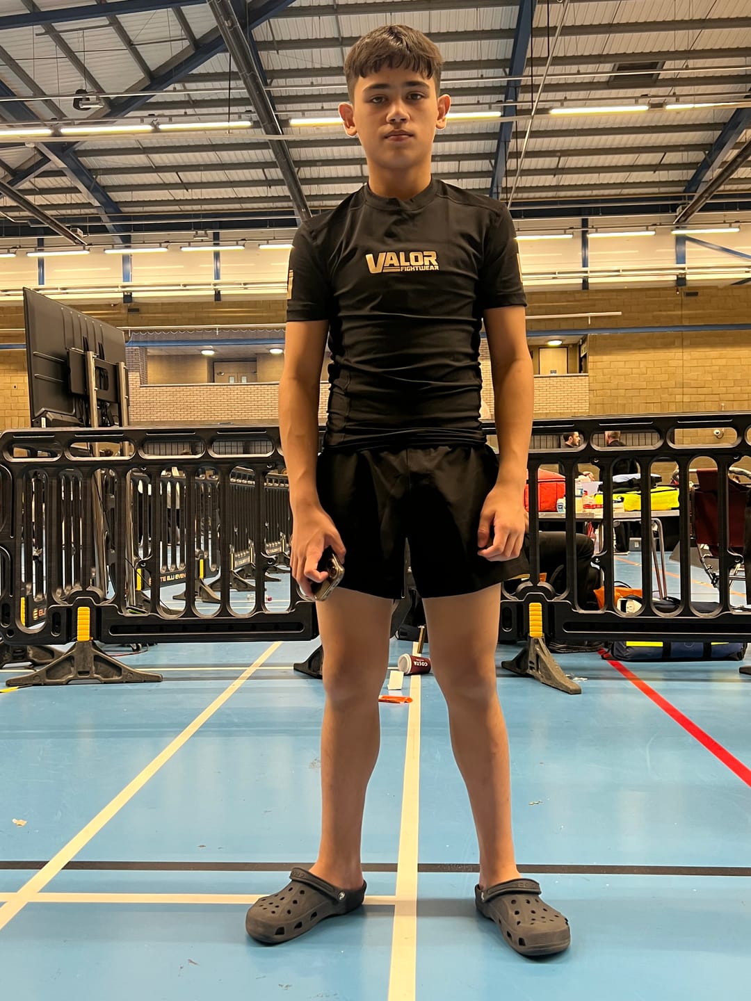Customer photo review of VALOR BLACK / GOLD MESH SHORT SLEEVE RASH GUARD