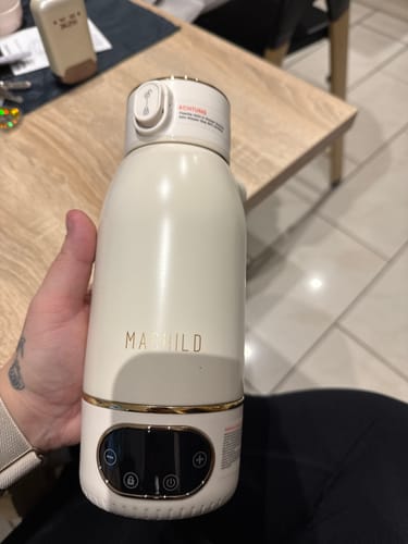 Customer photo review of Tragbarer Fläschchenwärmer + Milchpulverbox (weiß) + Schnell-Ladegerät