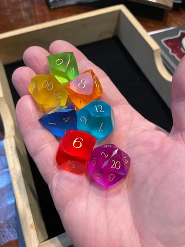 Customer photo review of URWizards D&D Resin Rainbow Candy Engraved Dice Set Multi-faceted Style