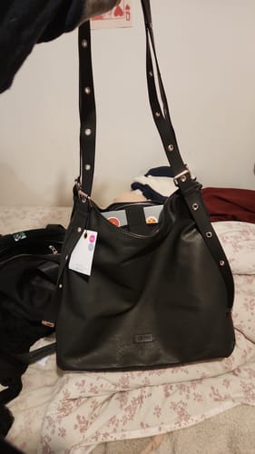Reseña con foto de un cliente sobre Cartera De Hombro Notebook Hebillas