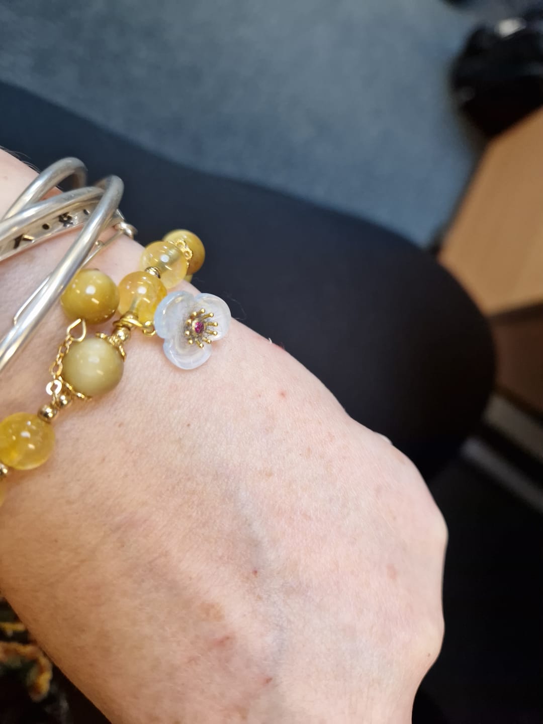 Customer photo review of Buddha Stones Citrine Tiger Eye Flower Charm Generosity Bracelet