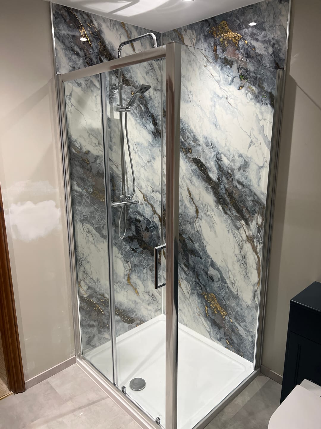 Customer photo review of 10mm Ocean Blue Gloss Shower Panel 1M x 2.4M