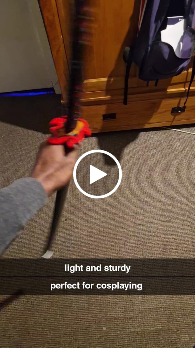 Customer video review of Demon Slayer Sword Tanjiro Rengoku Hilt Fire Breath Wooden Bamboo Cosplay Sword