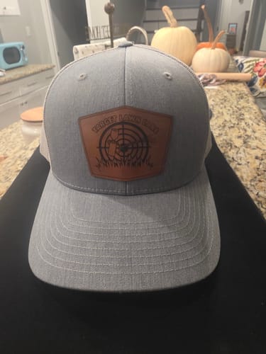 Customer photo review of Custom Leather Patch Trucker Hat - Richardson 112