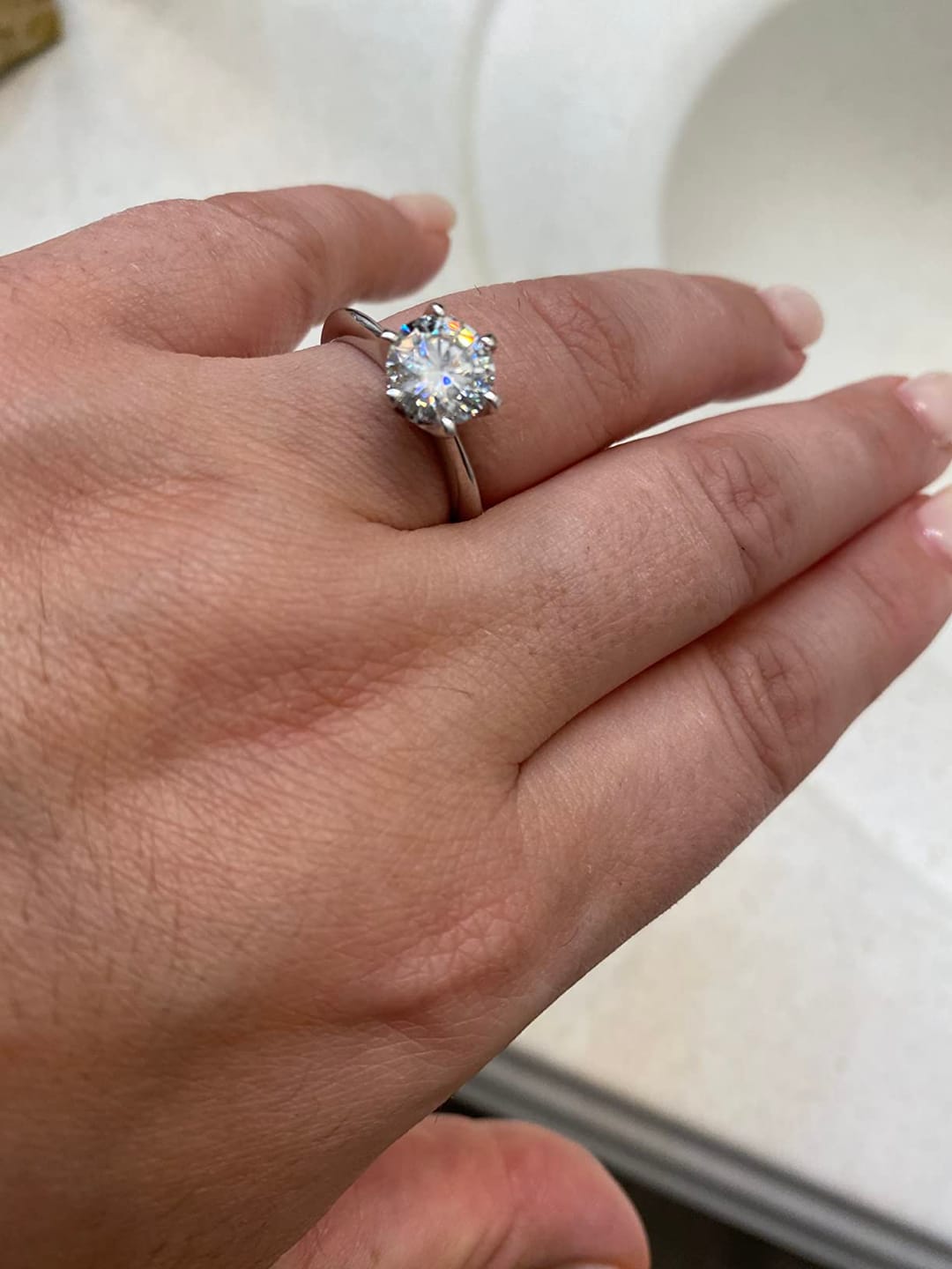 Customer photo review of Rodiffy Moissanite 2.0 Ct ～3.0Ct Round Cut 6 Prong White Gold Engagement Ring