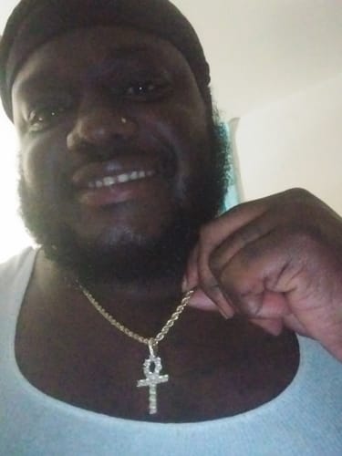 Customer photo review of FREE Tennis Cross CZ Iced Out Pendant