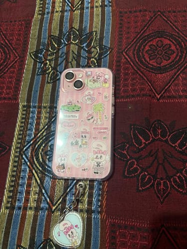 Customer photo review of Cute Pink Cartoon iPhone Case with Heart Charm – Soft Protective Cover