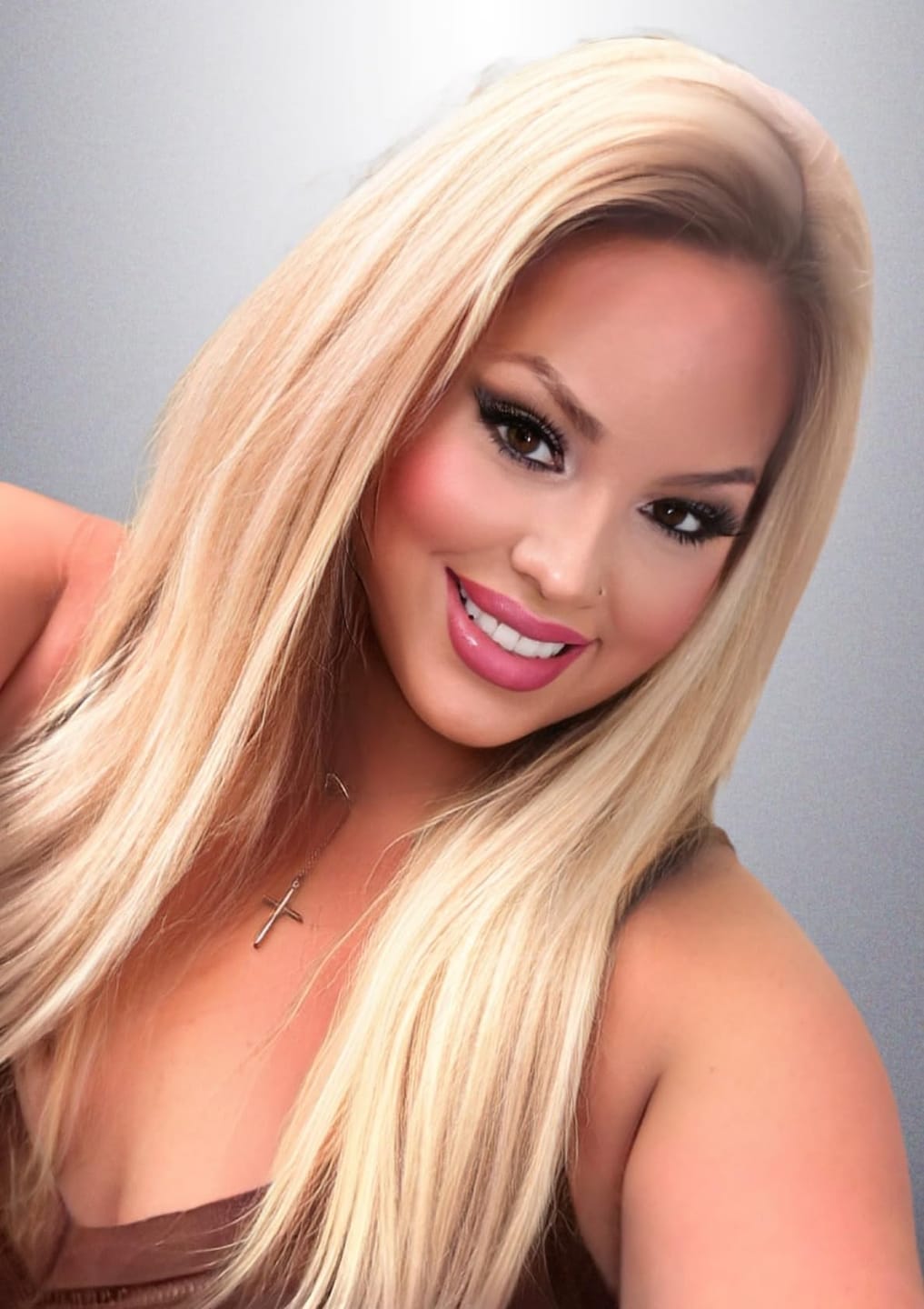Customer photo review of Seamless Tape in Hair Extensions Best Virgin Hair Lightest Blonde #60