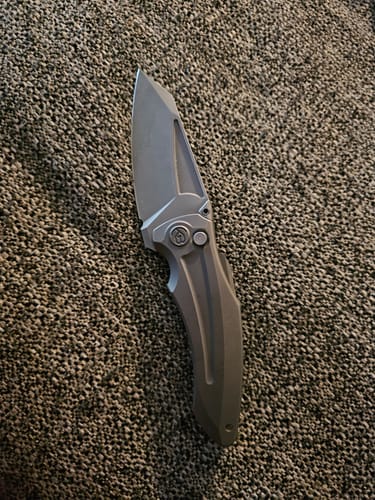 Customer photo review of Kubey Sumo Titanium Button Lock Knife CPM-20CV 3.15"