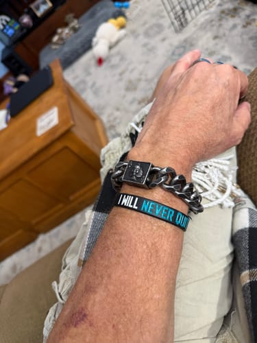 Customer photo review of Revenant’s Wrath Ace of Spades Cuban Link Bracelet: Helps Pair Veterans With A Service Dog or Shelter Dog