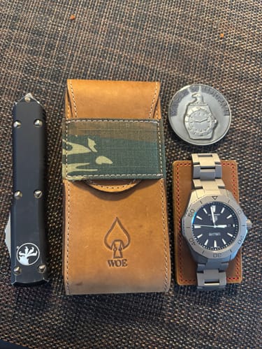 Customer photo review of Travel Pouch and Challenge Coin - NEW