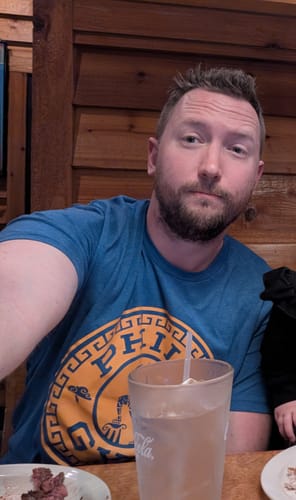 Customer photo review of Disney's Hercules "Phil's Gym" – Crewneck Tee