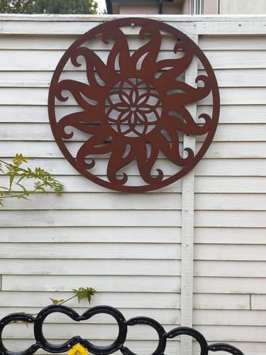 Customer photo review of Rusty Metal Sun Decoration