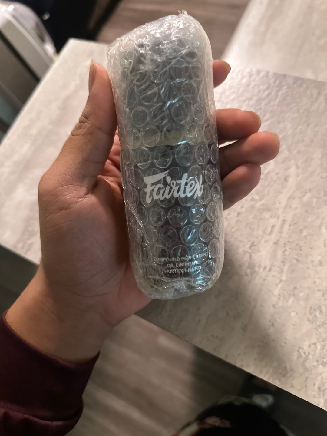 Customer photo review of Fairtex Muay Thai Boxing Muscle Pain Relief Liniment Oil