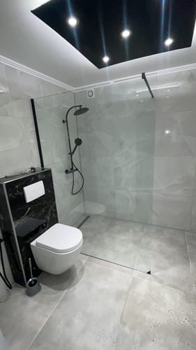 Customer photo review of SONNI Begehbare Dusche Duschabtrennung Duschwand 10mm Schwarz Duschabtrennung Duschkabine Nano ESG 80-140cm