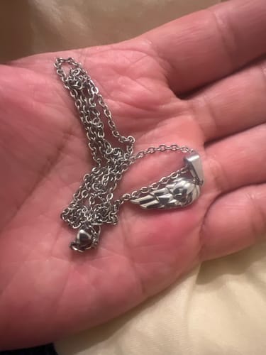 Customer photo review of Sterling Silver Wing Pendant Necklace