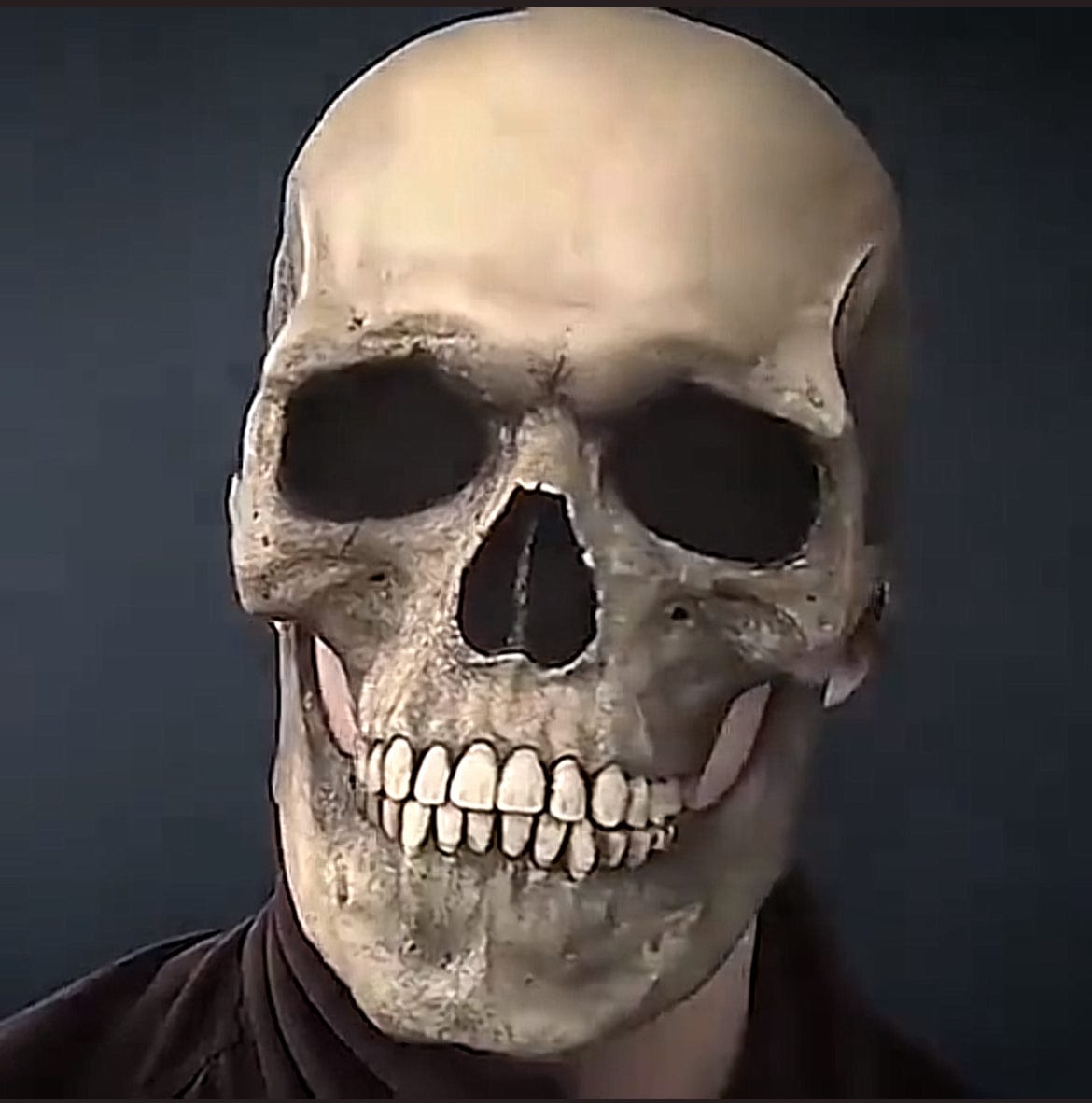 Customer photo review of Realistic Full Head Skull Mask with Movable Jaw - Unisex Halloween & Cosplay Accessory for Ultimate Spooky Experience