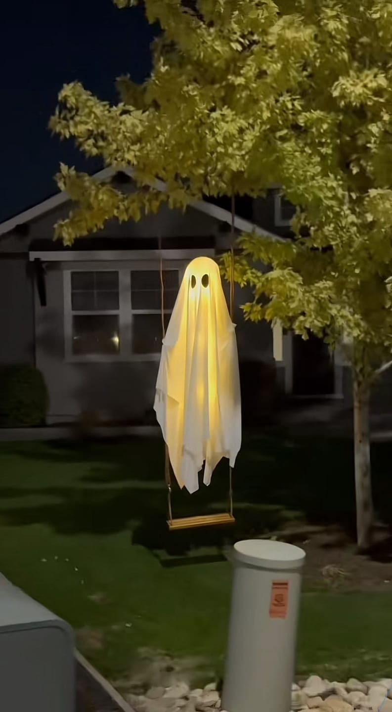 Customer photo review of Hanging Swing Ghost Decoration Halloween 2025 Porch Lights