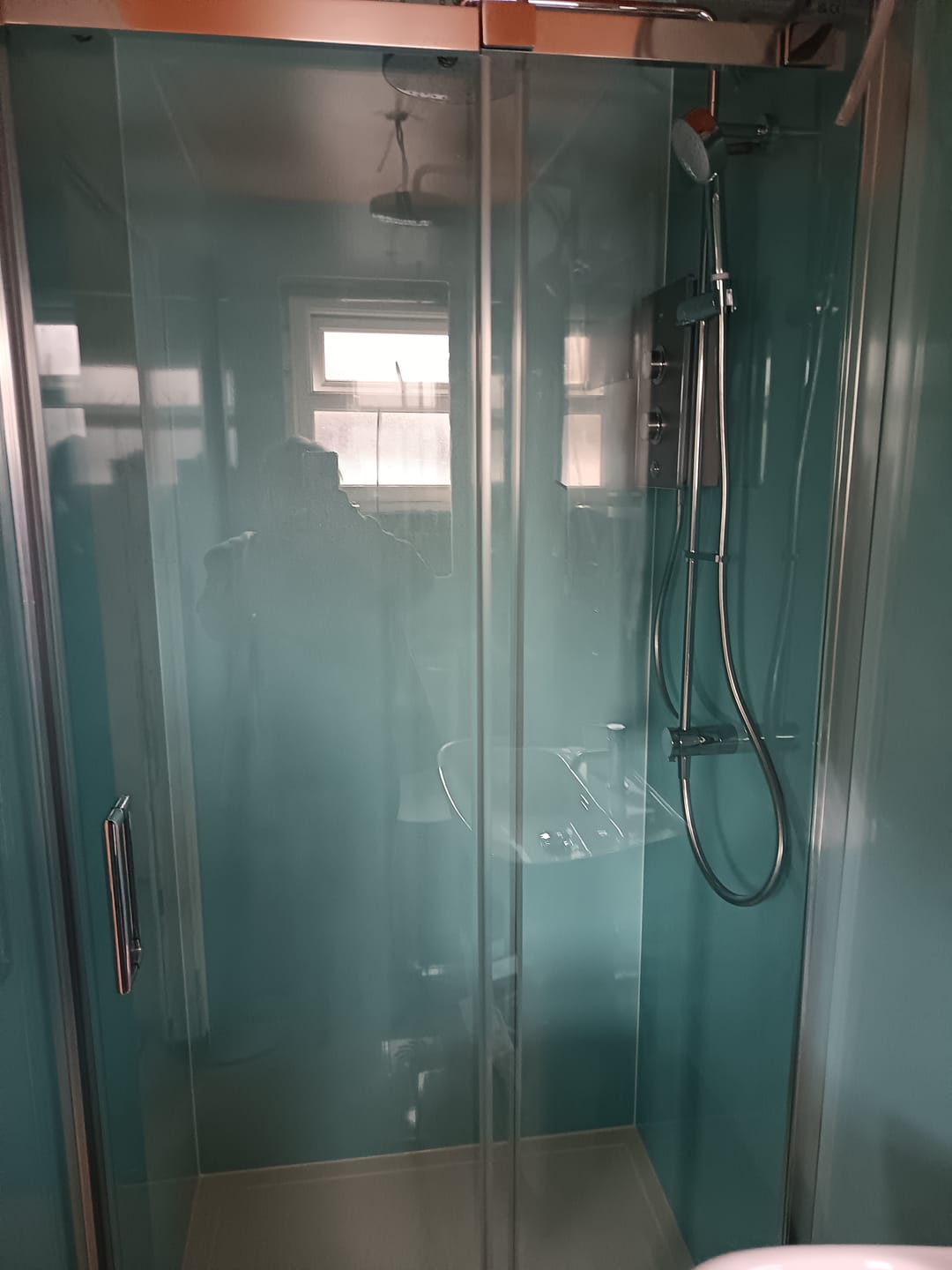 Customer photo review of 10mm Aqua Blue Shimmer Gloss Shower Panel 1M x 2.4M
