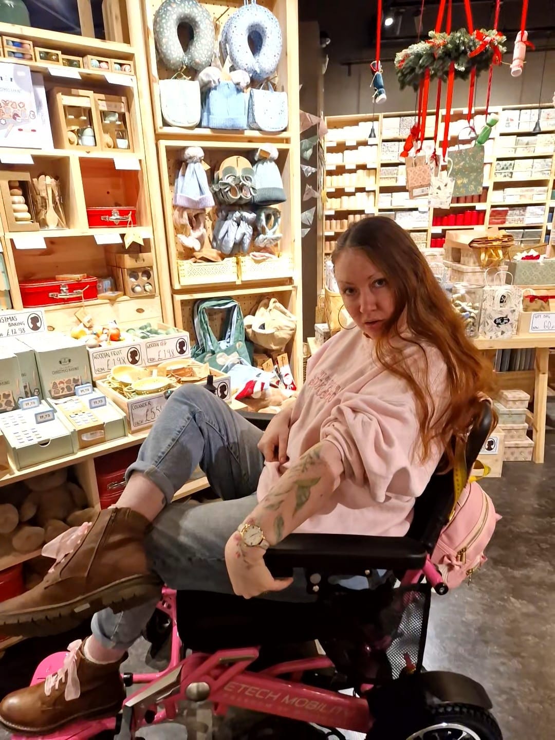 Customer photo review of Limited Edition Pink Lightweight Electric Wheelchair | Freedom Pro ST