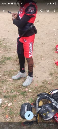 Customer photo review of Tom and Jerry "Cheddar Chase" Football Cleats - Quantum Speed by Phenom Elite