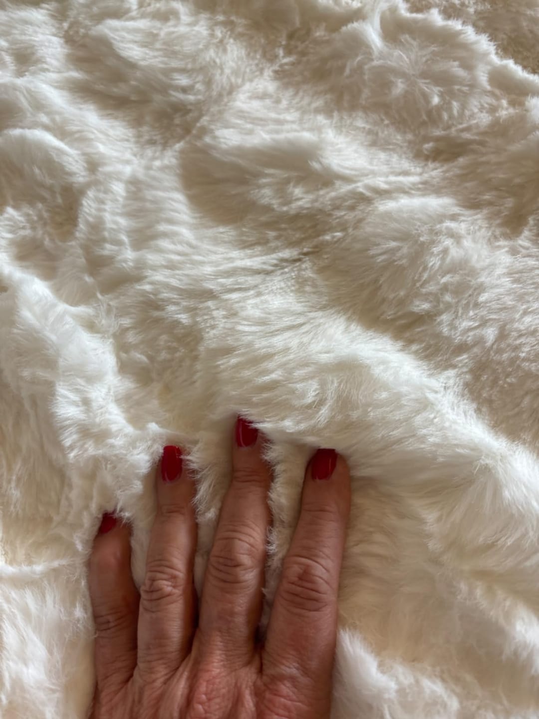 Customer photo review of Cubre Sofá Piel de Conejo — Lujo suave que protege tu sofá