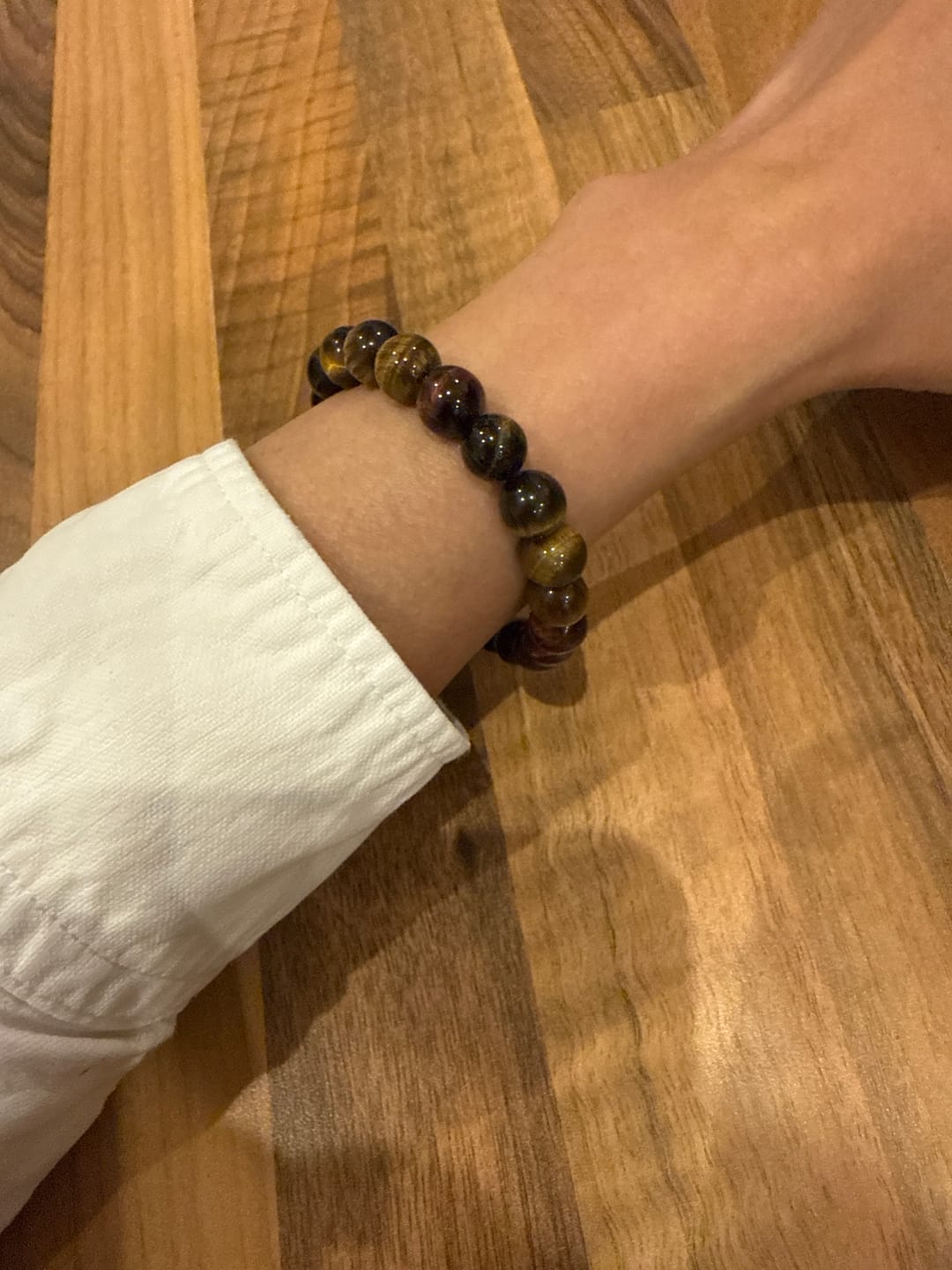 Customer photo review of Buddha Stones Natural Tiger Eye Positive Protection Bracelet