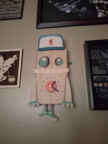 Customer photo review of Chuck the Robot Pendulum Clock
