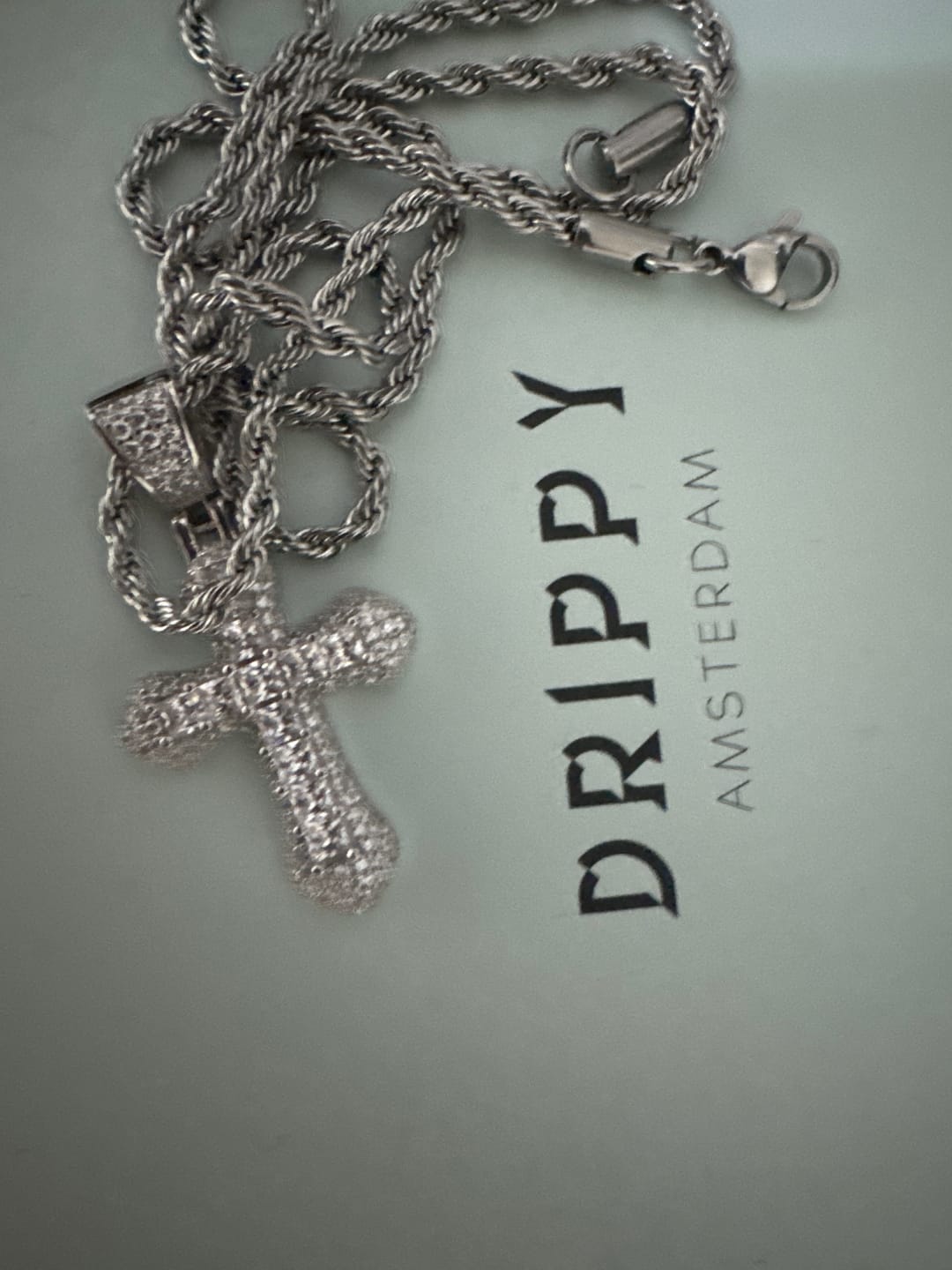 Customer photo review of FROSTY CROSS PENDANT.