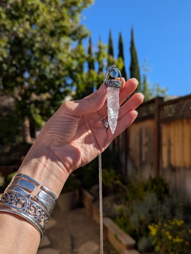 Customer photo review of Kailash-Blessed Spiritual Energy Pendant - Clear Quartz Aquamarine Silver