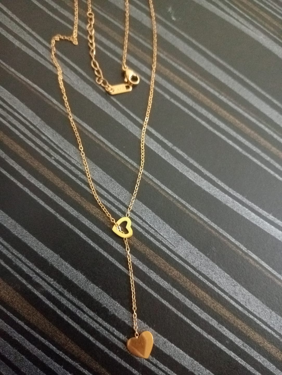 Customer photo review of Two Heart Gold Lariat Necklace