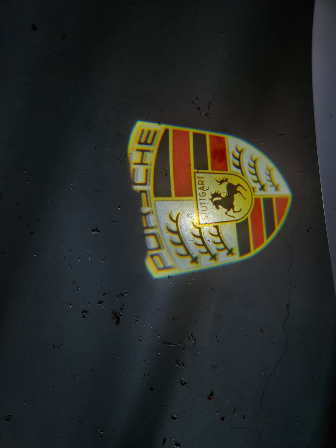 Customer photo review of PORSCHE Original  LOGO PROJECTOT LIGHTS Nr.8003 (quantity  1 =  2 Logo Film /  2 door lights)