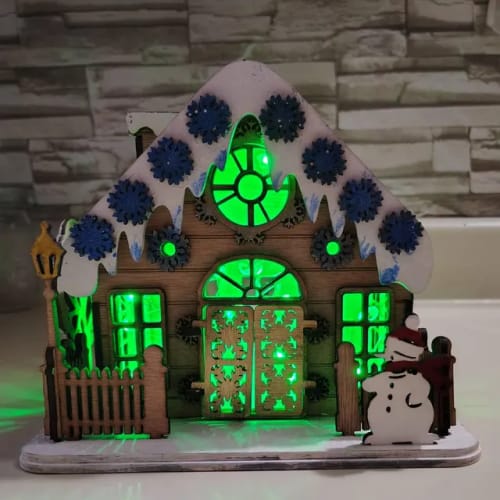 Customer photo review of Laser cut Christmas house scene lamp svg file