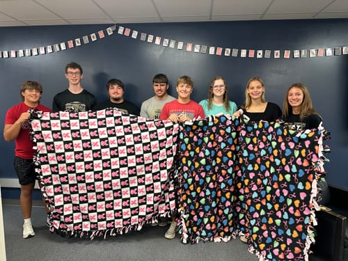 Customer photo review of Pink Ribbon Cancer Colored Heart on Black Fleece Fabric