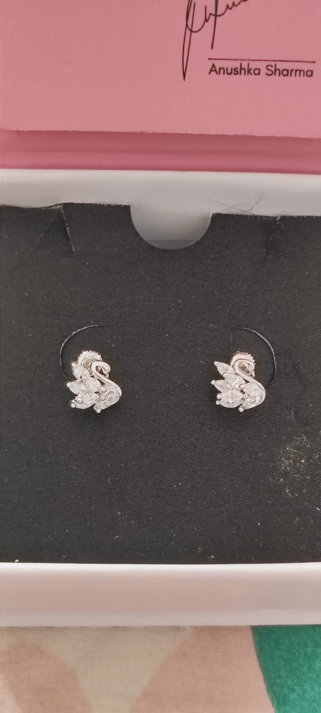 Customer photo review of Manali's Shining Swan Studs