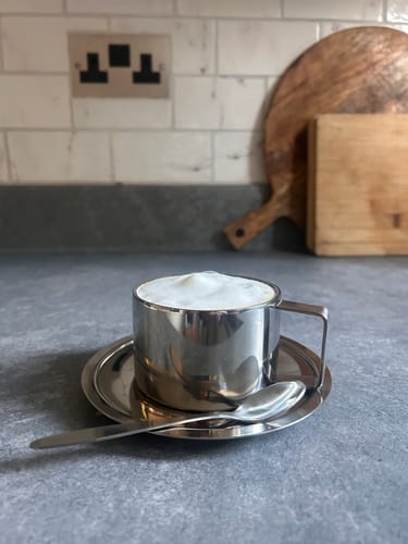 Customer photo review of Italian Style Steel Latte Coffee Cup With Saucer & Spoon