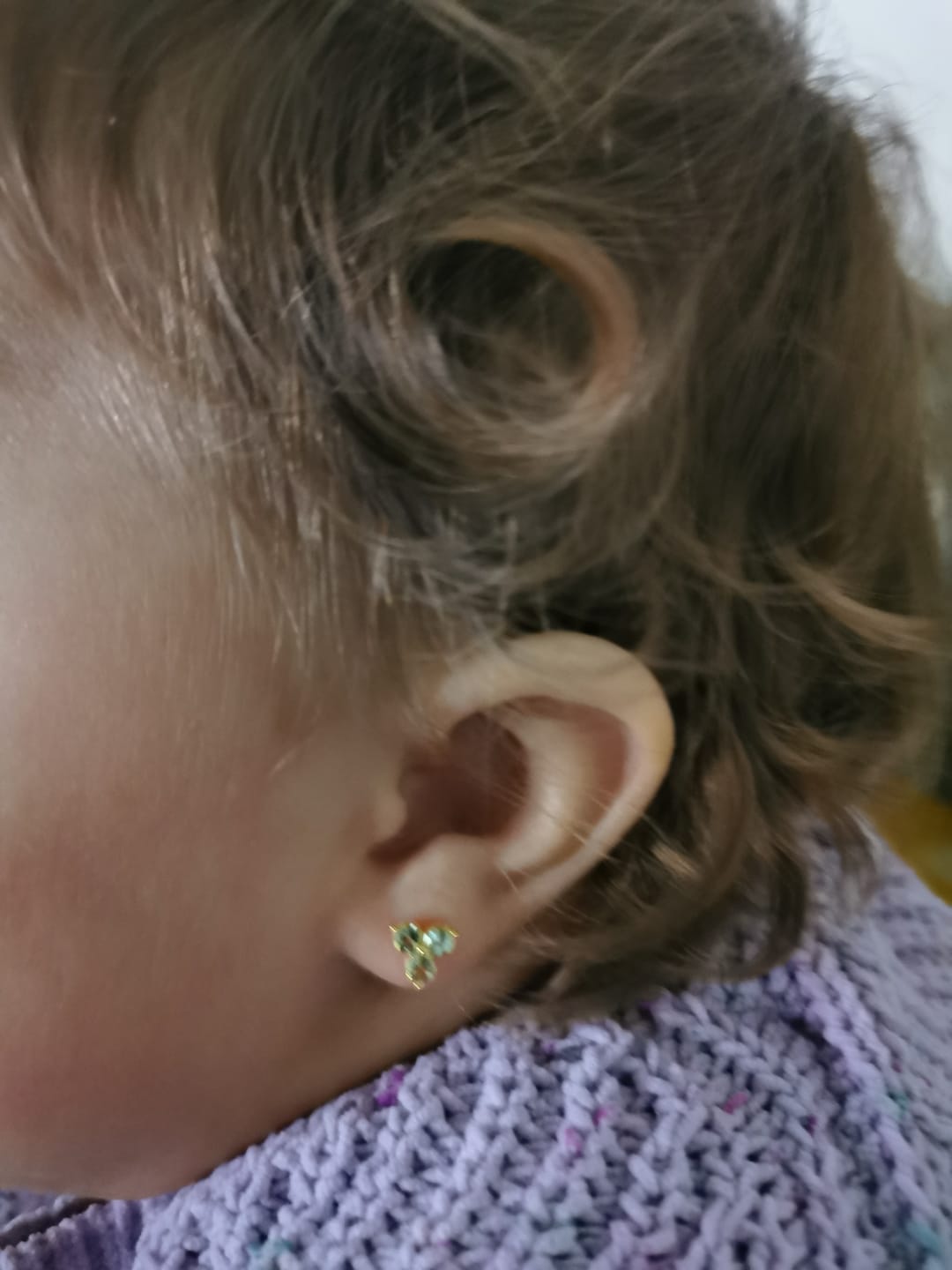 Customer photo review of Trinity Birthstone Sleep Stud Earrings