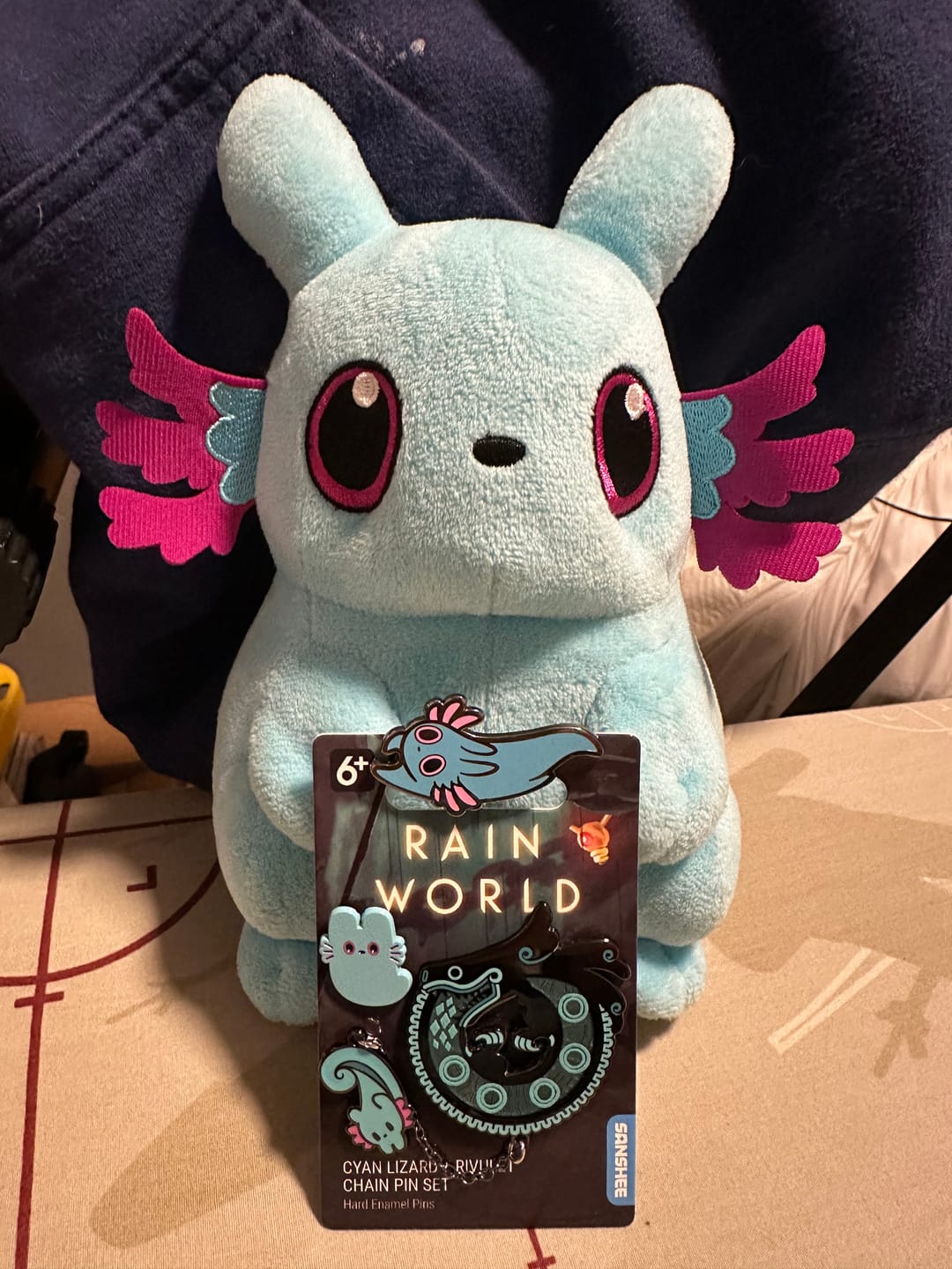 Customer photo review of Rain World - Cyan Lizard Hanger Pin