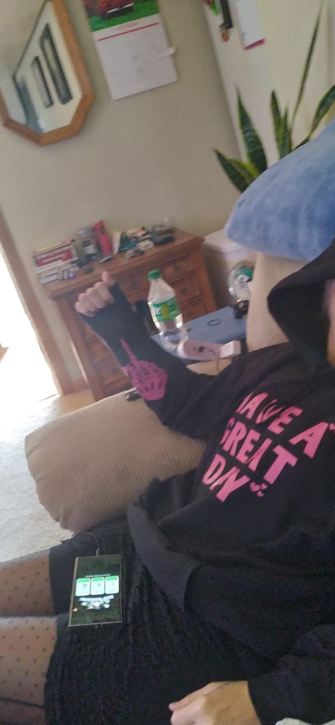 Customer photo review of Have A Great Day Hoodie, Skeleton Middle Finger Sleeve Graphic, Sassy, Funny Hooded Sweatshirt
